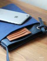 キャンバスと革を組み合わせた存在感のあるサコッシュ